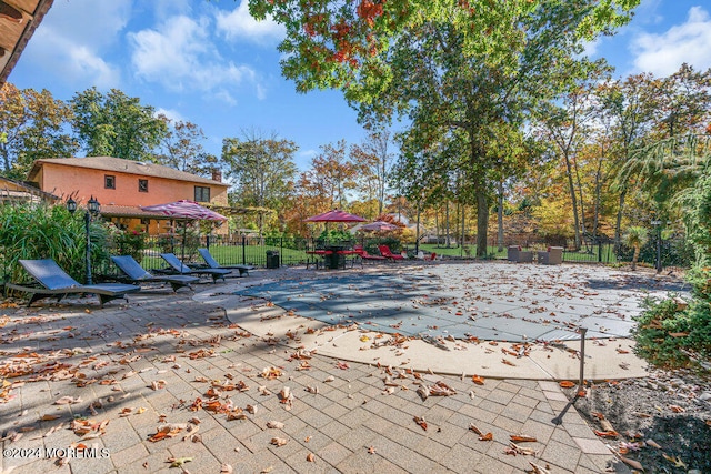 view of pool featuring a patio area