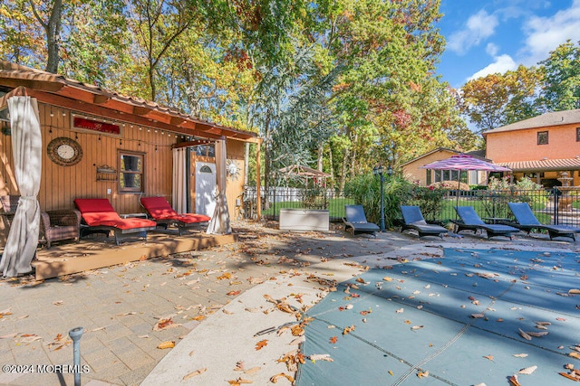 view of patio / terrace with a swimming pool