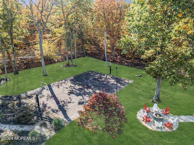 view of yard with basketball court