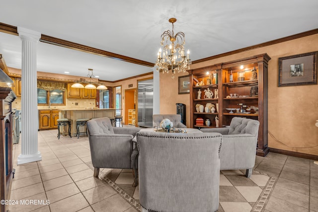 tiled living room with ornate columns, ornamental molding, and a notable chandelier