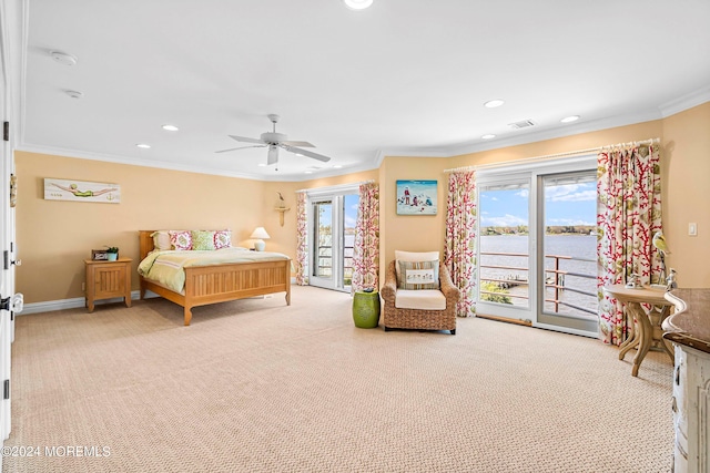 bedroom with ceiling fan, access to exterior, ornamental molding, and a water view