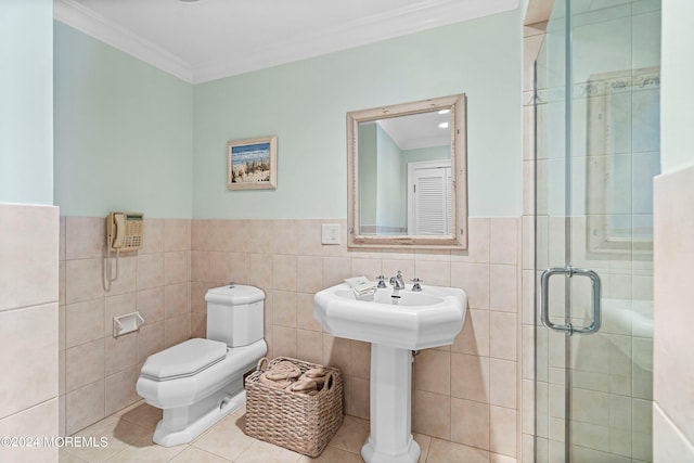 bathroom with walk in shower, tile patterned floors, tile walls, and ornamental molding