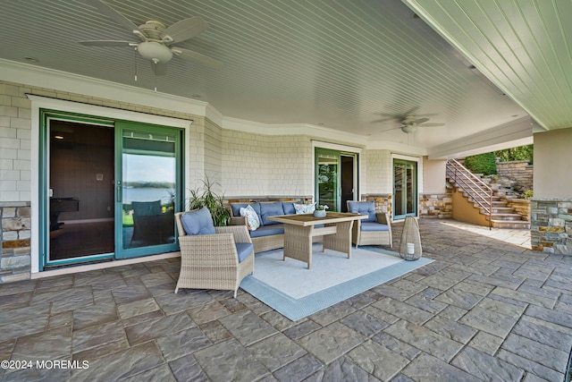 view of patio / terrace with ceiling fan and an outdoor hangout area