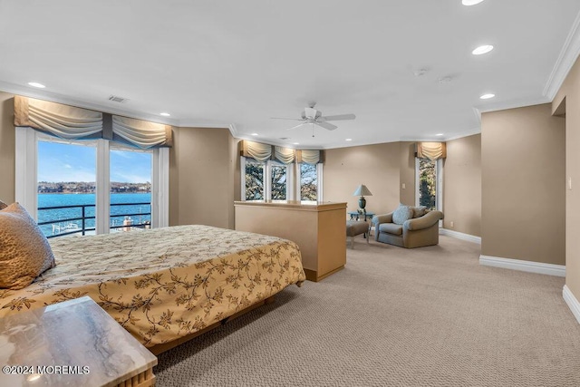 bedroom featuring access to exterior, light carpet, ceiling fan, crown molding, and a water view