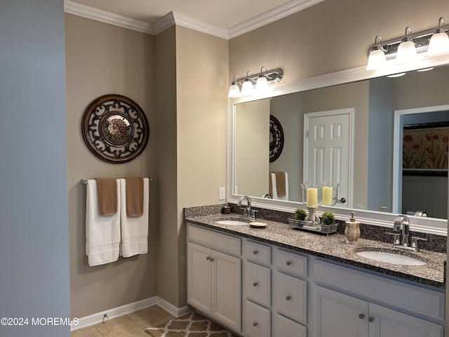 bathroom featuring tile patterned flooring, vanity, and ornamental molding