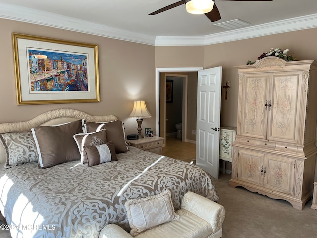 bedroom with ceiling fan, crown molding, and light carpet