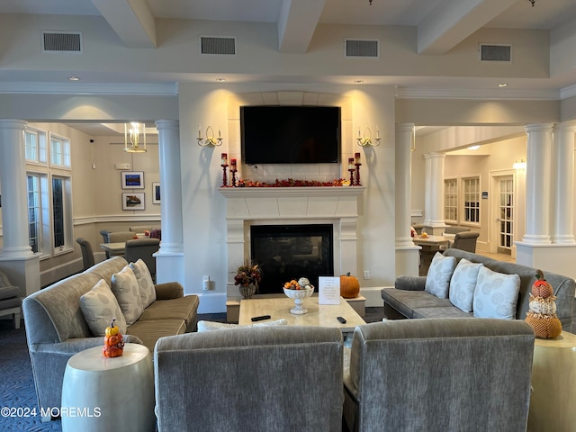 living room with beamed ceiling and ornamental molding