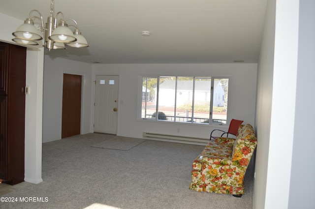 carpeted foyer featuring a chandelier and a baseboard radiator