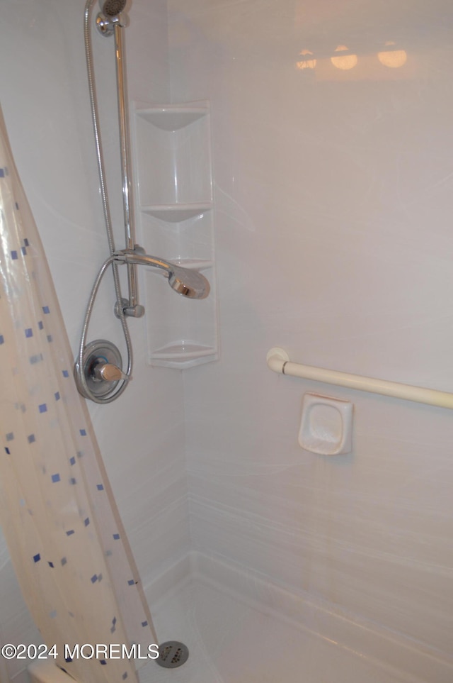 interior space featuring walk in shower