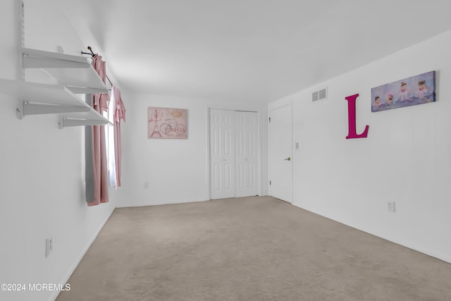 empty room featuring carpet floors