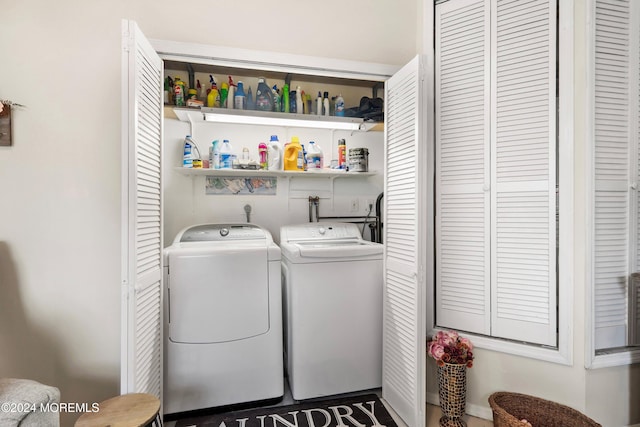 laundry room featuring washer and clothes dryer