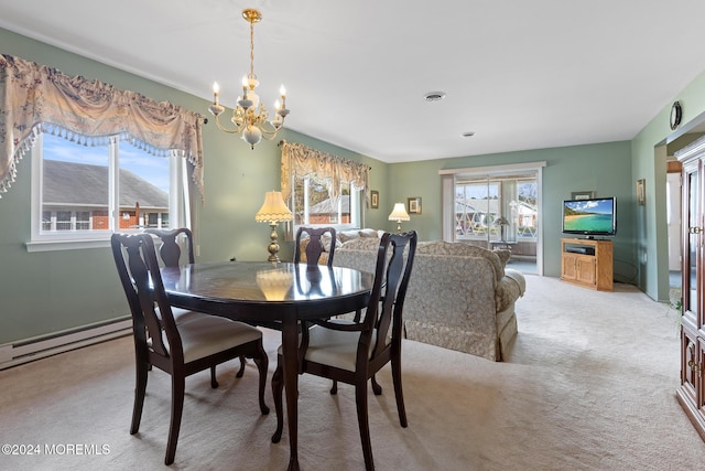 dining space with light carpet and an inviting chandelier