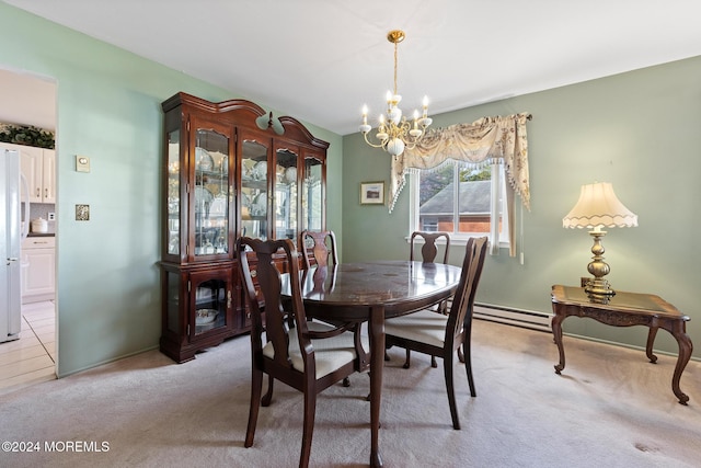 dining area with a notable chandelier, light colored carpet, and a baseboard radiator