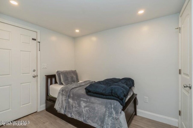 bedroom featuring light hardwood / wood-style floors