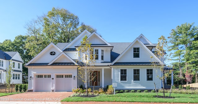 3 Bingham Ct, Rumson, NJ 07760 - view of front of house featuring a standing seam roof, decorative driveway, a front lawn, metal roof, and roof with shingles