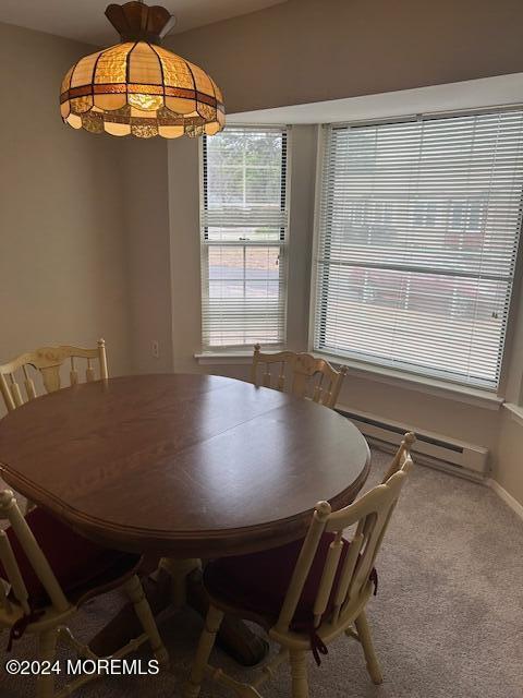 15 Alpine Rd Unit A, Whiting, NJ 08759 - dining area with carpet floors and a baseboard radiator