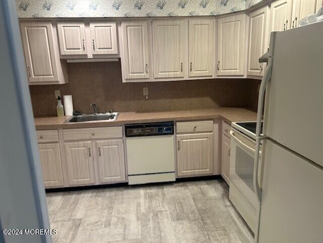 15 Alpine Rd Unit A, Whiting, NJ 08759 - kitchen featuring white appliances, wallpapered walls, and light countertops