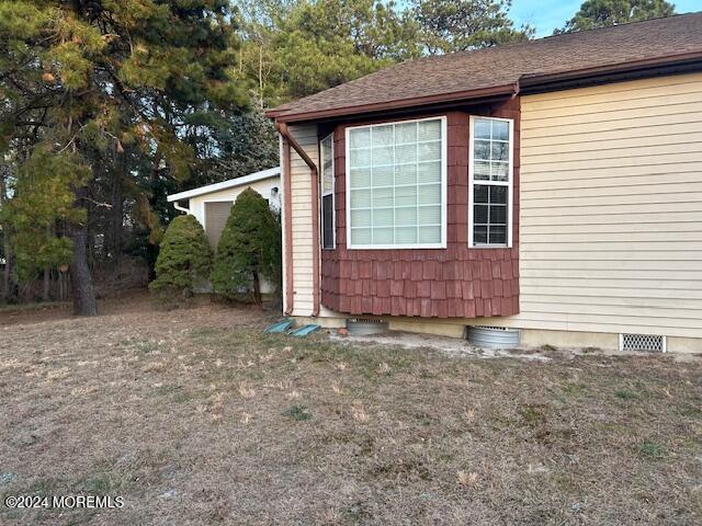 15 Alpine Rd Unit A, Whiting, NJ 08759 - view of property exterior with a shingled roof