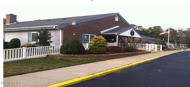 15 Alpine Rd Unit A, Whiting, NJ 08759 - view of home's exterior featuring a chimney