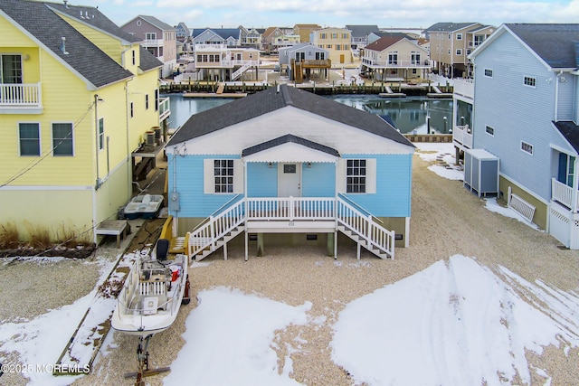 view of front of home featuring a water view