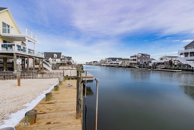 dock area featuring a water view