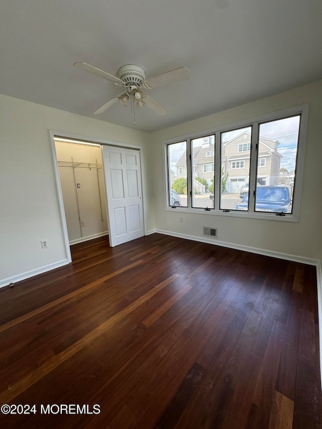 7 Point Rd, Toms River, NJ 08753 - unfurnished bedroom with dark hardwood / wood-style flooring, ceiling fan, and a closet