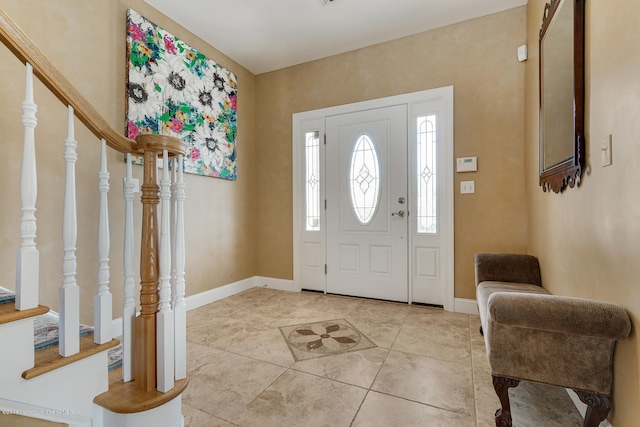 entryway featuring light tile patterned flooring