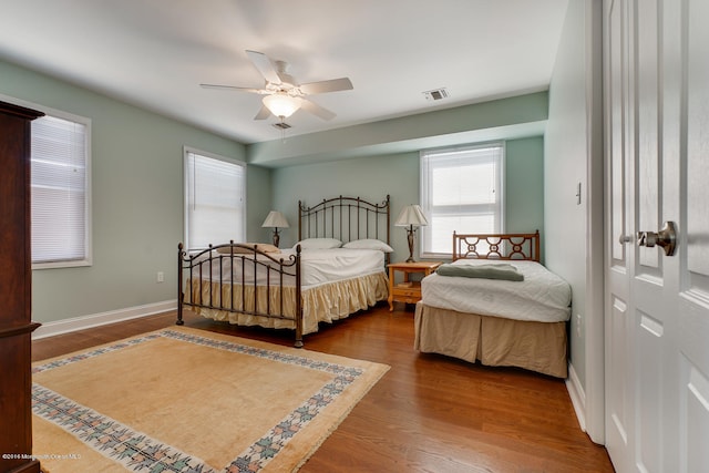 bedroom featuring ceiling fan and hardwood / wood-style floors