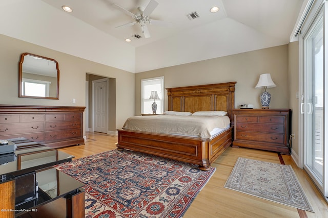 bedroom with multiple windows, ceiling fan, and light wood-type flooring