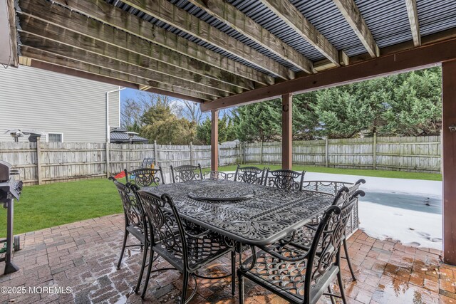 view of patio / terrace with outdoor dining area and a fenced backyard