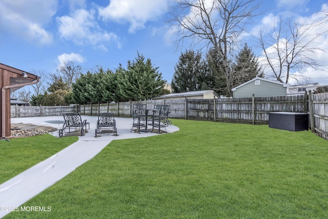 view of yard with a patio area and a fenced backyard