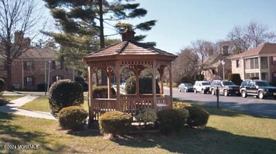 view of home's community featuring a gazebo and a lawn