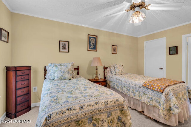 bedroom featuring ceiling fan, crown molding, light colored carpet, and a textured ceiling