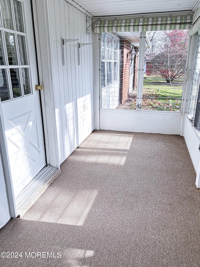 unfurnished sunroom with a healthy amount of sunlight