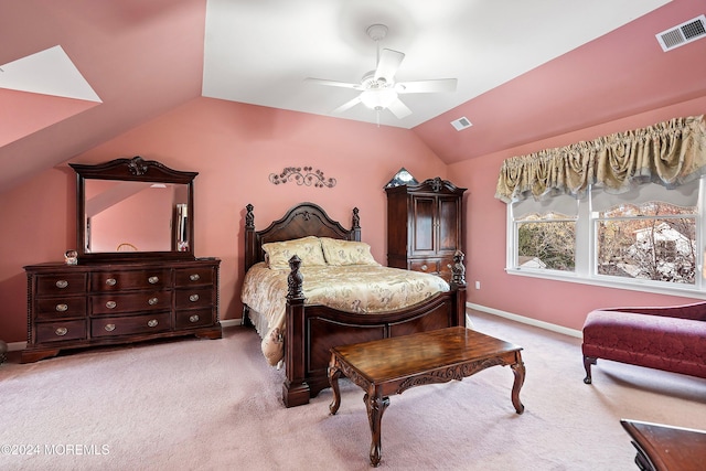 bedroom with ceiling fan, light carpet, and lofted ceiling