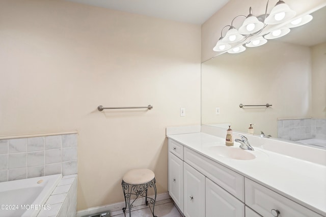 bathroom with a relaxing tiled tub and vanity