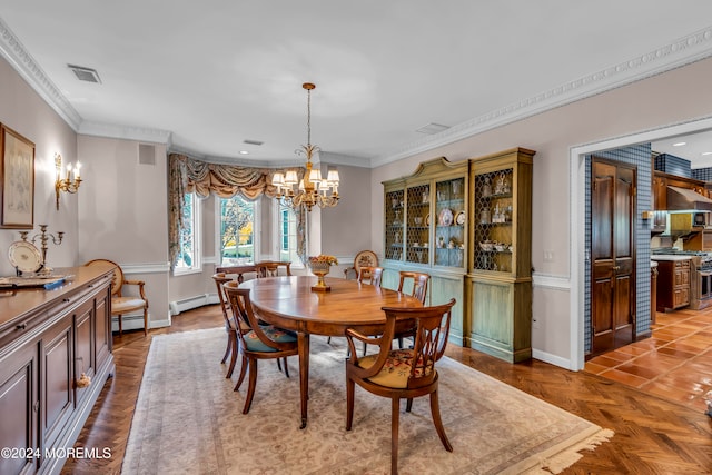 dining area with a chandelier, ornamental molding, parquet floors, and a baseboard heating unit