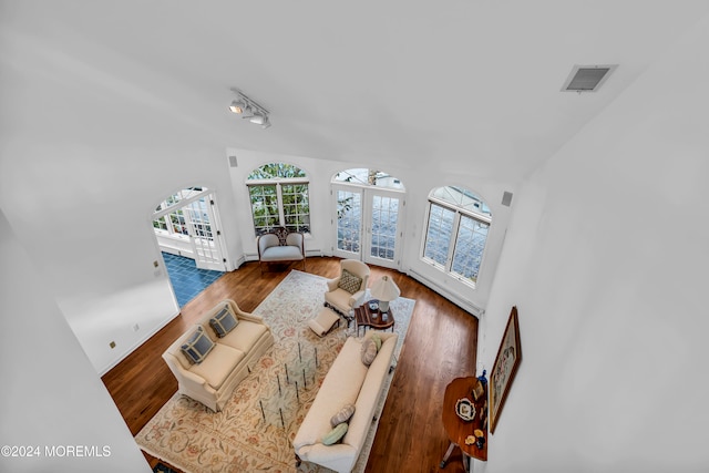 living room with hardwood / wood-style flooring and french doors