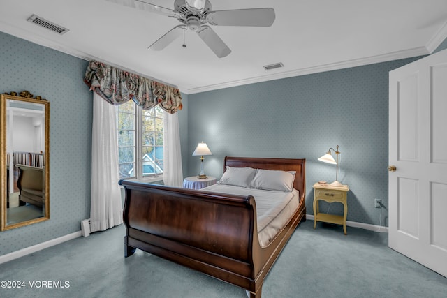 bedroom with ceiling fan, carpet floors, and crown molding