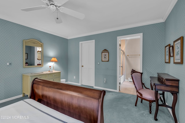 carpeted bedroom featuring ceiling fan, ornamental molding, and a closet