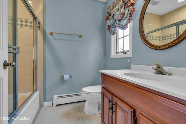 full bathroom with vanity, a baseboard heating unit, tile patterned flooring, toilet, and enclosed tub / shower combo