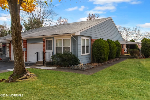 ranch-style home with a garage and a front yard