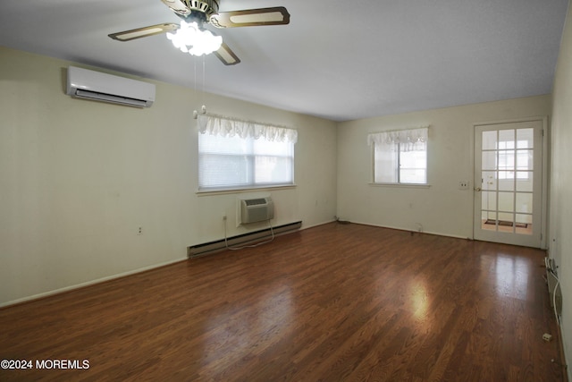 unfurnished room featuring dark hardwood / wood-style floors, ceiling fan, baseboard heating, and a wall mounted AC