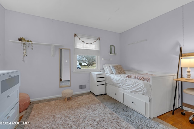 bedroom with light wood-type flooring