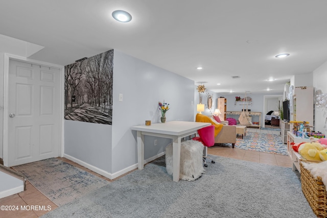 interior space featuring light tile patterned floors