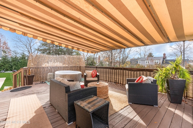 wooden terrace featuring outdoor lounge area