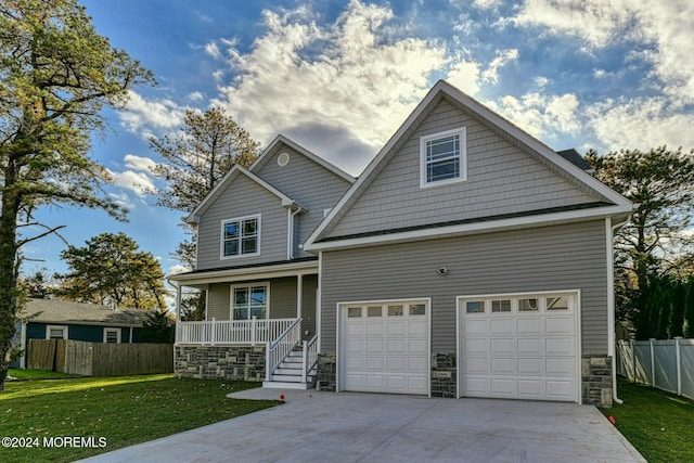 craftsman-style home with a porch and a front lawn