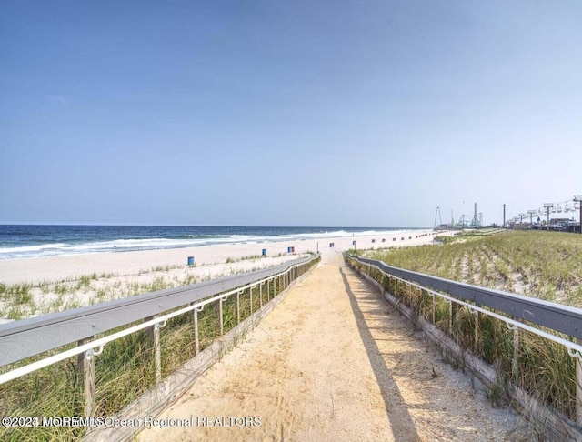 view of water feature featuring a beach view