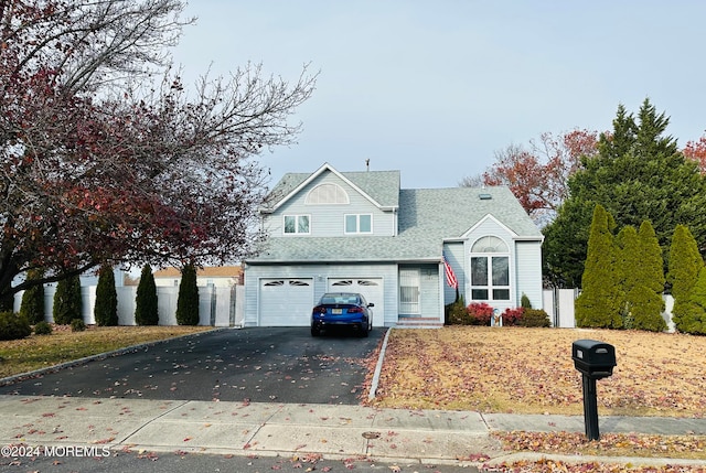 front of property featuring a garage