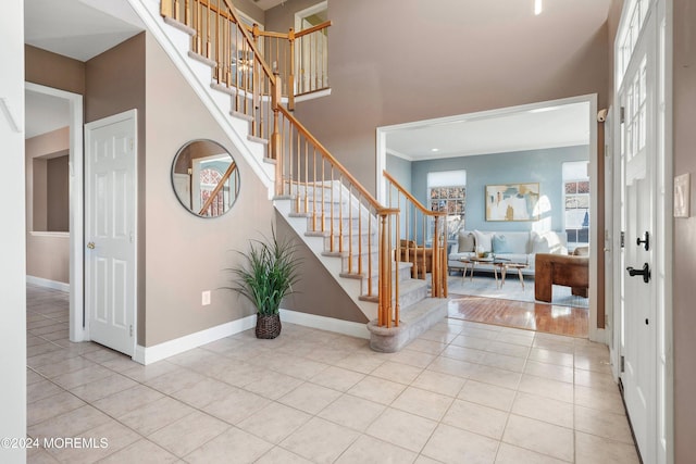 foyer entrance with light hardwood / wood-style floors